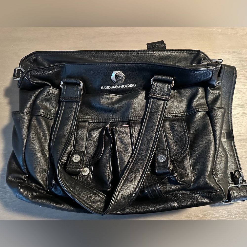 Thinkgeek handbag of holding